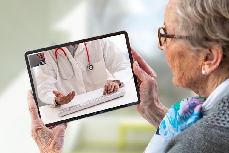 A doctor conducting a remote consultation with a patient. The patient is at home, and the doctor is on a video call,